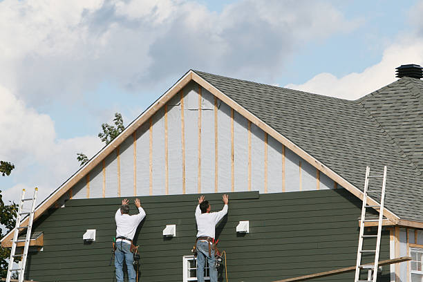 Professional Siding Replacement technician working in Newton Upper Falls, MA